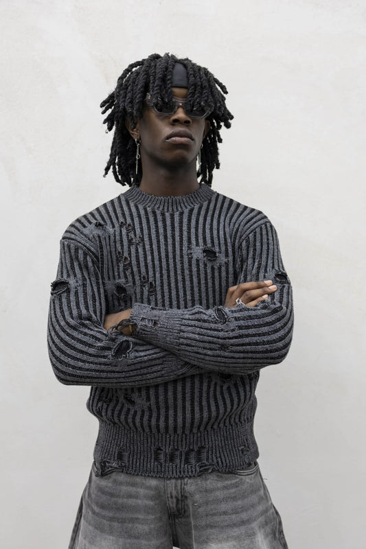 Maglione girocollo con rotture